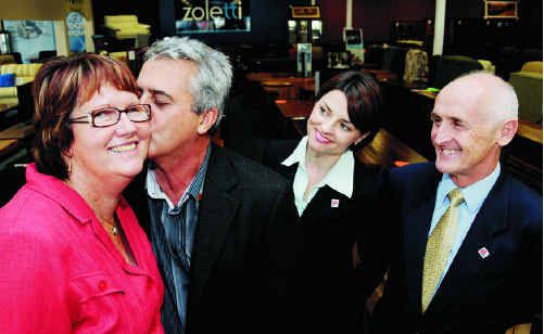 Kissing hello to a future with no MS, Ross and Daphne Davies handed a $60,630 cheque to MS Research Australia’s executive director Jeremy Wright and MS Aust (Qld) advocacy manager Natalie Walsh. Kissing hello to a future with no MS, Ross and Daphne Davies handed a $60,630 cheque to MS Research Australia’s executive director Jeremy Wright and MS Aust (Qld) advocacy manager Natalie Walsh.